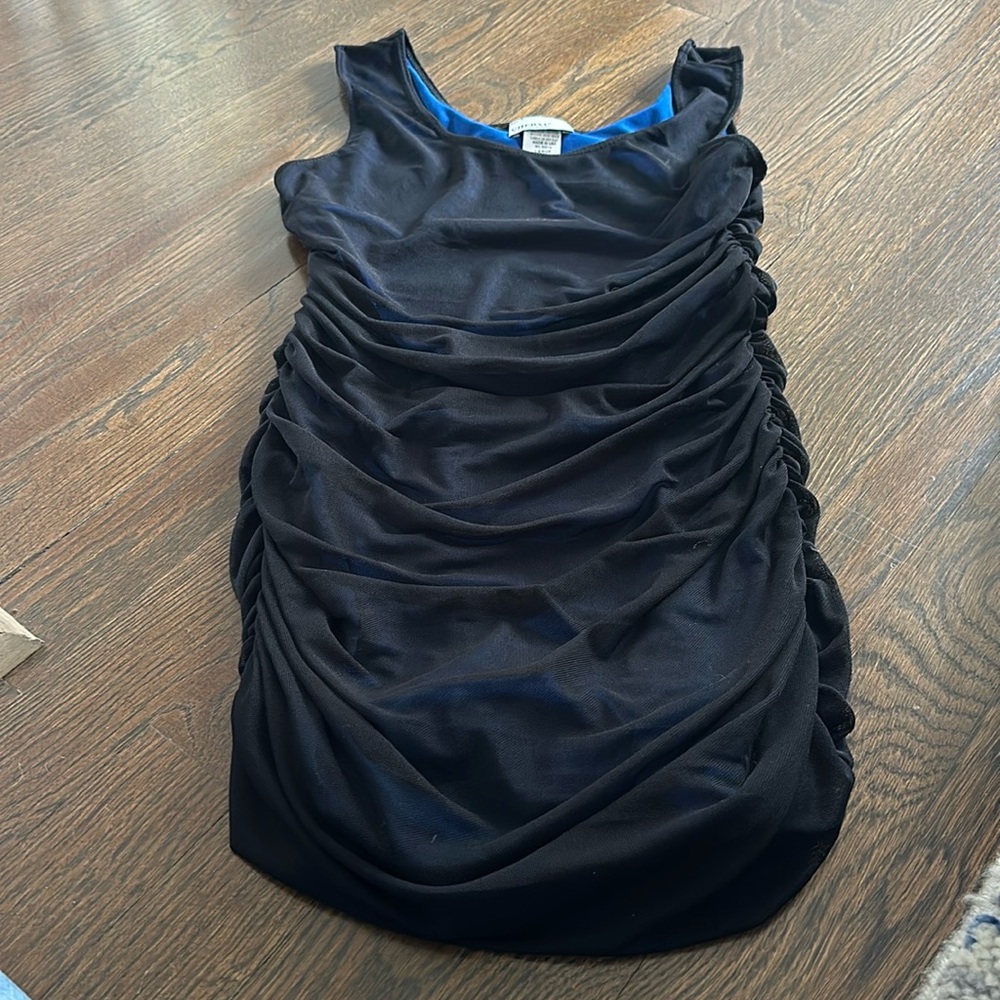 Cheryl Creation Kids. Kids large. Black with blue underlay.